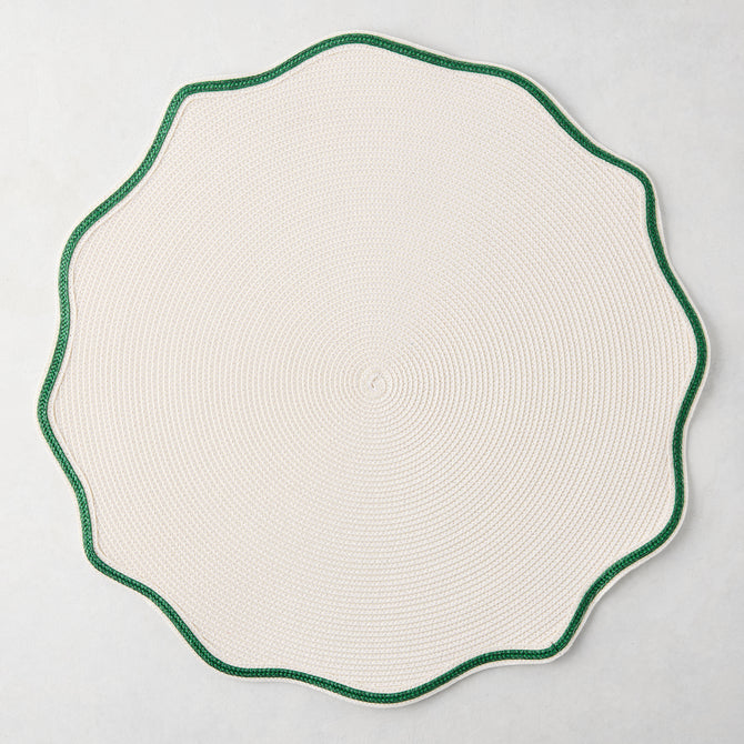 16-inch round off-white woven nylon placemat with a scalloped edge and pine green piped border.