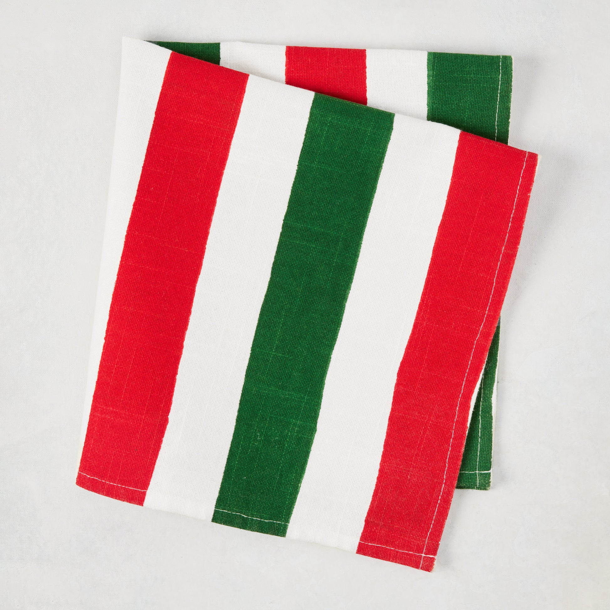 Holiday Hampton Stripe Napkin, red, green, and white block-printed cotton napkin.