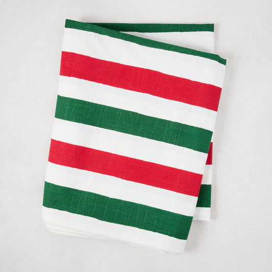Folded Holiday Red and Green Hampton Stripe Tablecloth, hand block-printed cotton, 108"L x 70"W.
