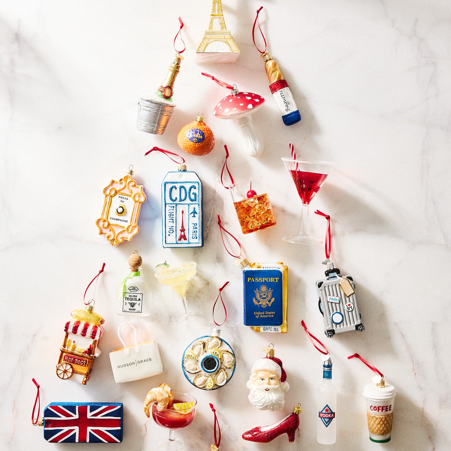 Hand-painted glass and resin hot dog stand Christmas ornament with red and white striped awning, 4 inches tall.