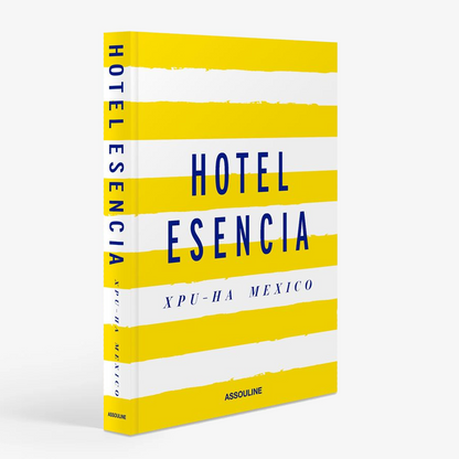 Hotel Escenica book with yellow and white stripes, blue text, and "XPU-HA MEXICO" on the cover.
