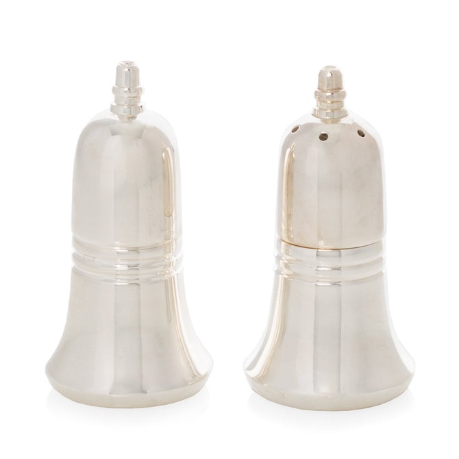 Silverplate bell-shaped salt and pepper shakers with minimalist design.