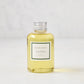 Hudson Grace Aspen Diffuser Oil Refill, 4oz clear glass bottle with light yellow oil and silver cap.
