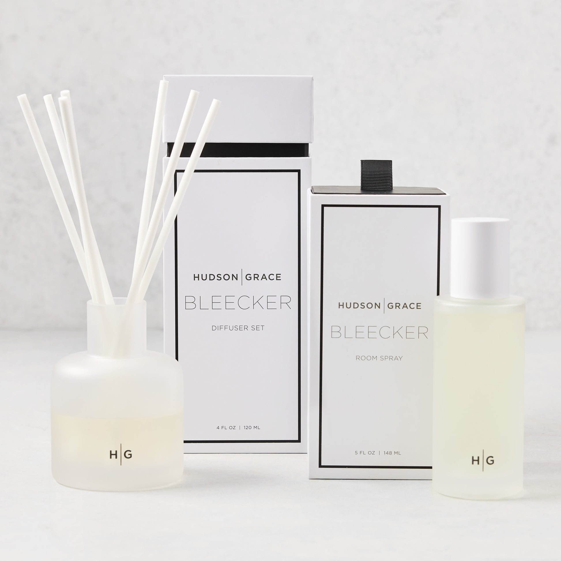 Hudson Grace Bleecker Room Spray and Diffuser Gift Set with minimalist frosted glass vessels and white packaging.