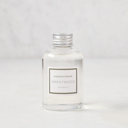 Hudson Grace Brentwood Diffuser Oil, clear glass bottle with silver cap and white label.