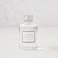 Hudson Grace Brentwood Diffuser Oil Refill, clear glass bottle with silver cap and white label.