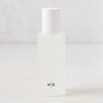 Hudson Grace Brentwood Room Spray, 5.08 oz, in a frosted glass bottle with white cap and HG logo.