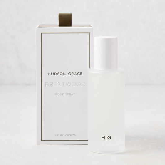 Hudson Grace Brentwood Room Spray, 5 oz frosted glass bottle with white cap, next to its white box.