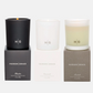 Hudson Grace East Coast scented candle gift set: black, white, and pale green candles with matching boxes.