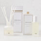 Hudson Grace Greenwich Room Spray and Diffuser Gift Set with frosted glass vessels and white boxes.