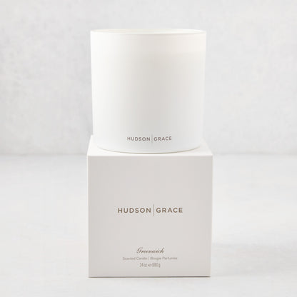 Hudson Grace Greenwich 3-wick candle in a white glass vessel, with matching white box.