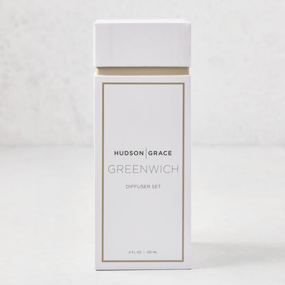 Hudson Grace Greenwich Scented Reed Diffuser set in a white box with gold trim, 4 fl oz.