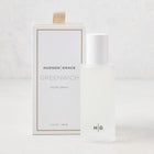 Hudson Grace Greenwich Room Spray: frosted glass bottle, white cap, next to white box with gold ribbon.