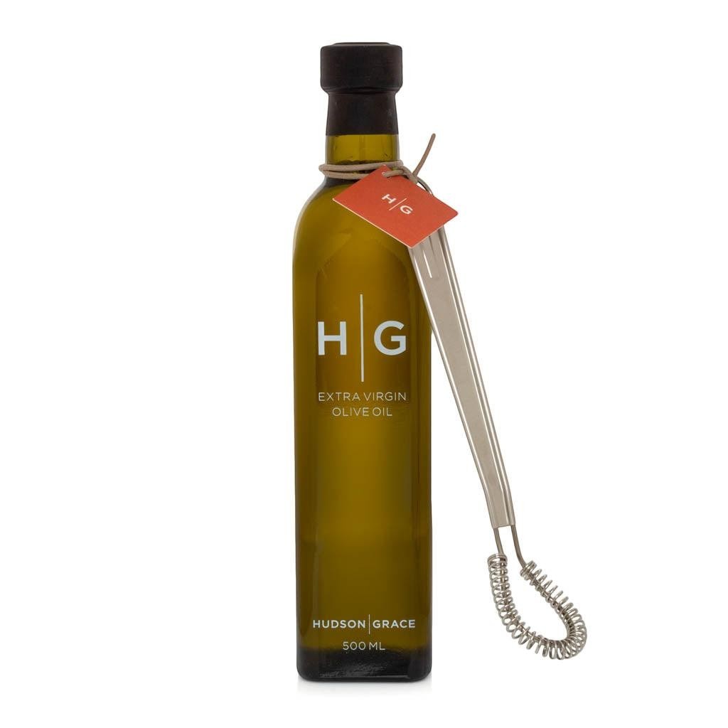 Hudson Grace 16.9 fl oz olive oil in a dark green glass bottle with a black cap and metal whisk.