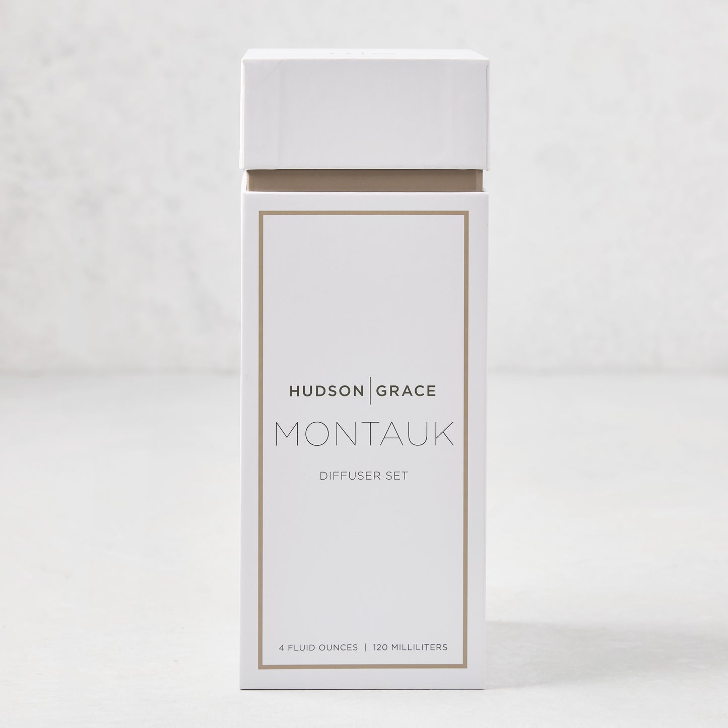 Hudson Grace Montauk Scented Reed Diffuser Set, white box with brown trim, 4 fl oz.