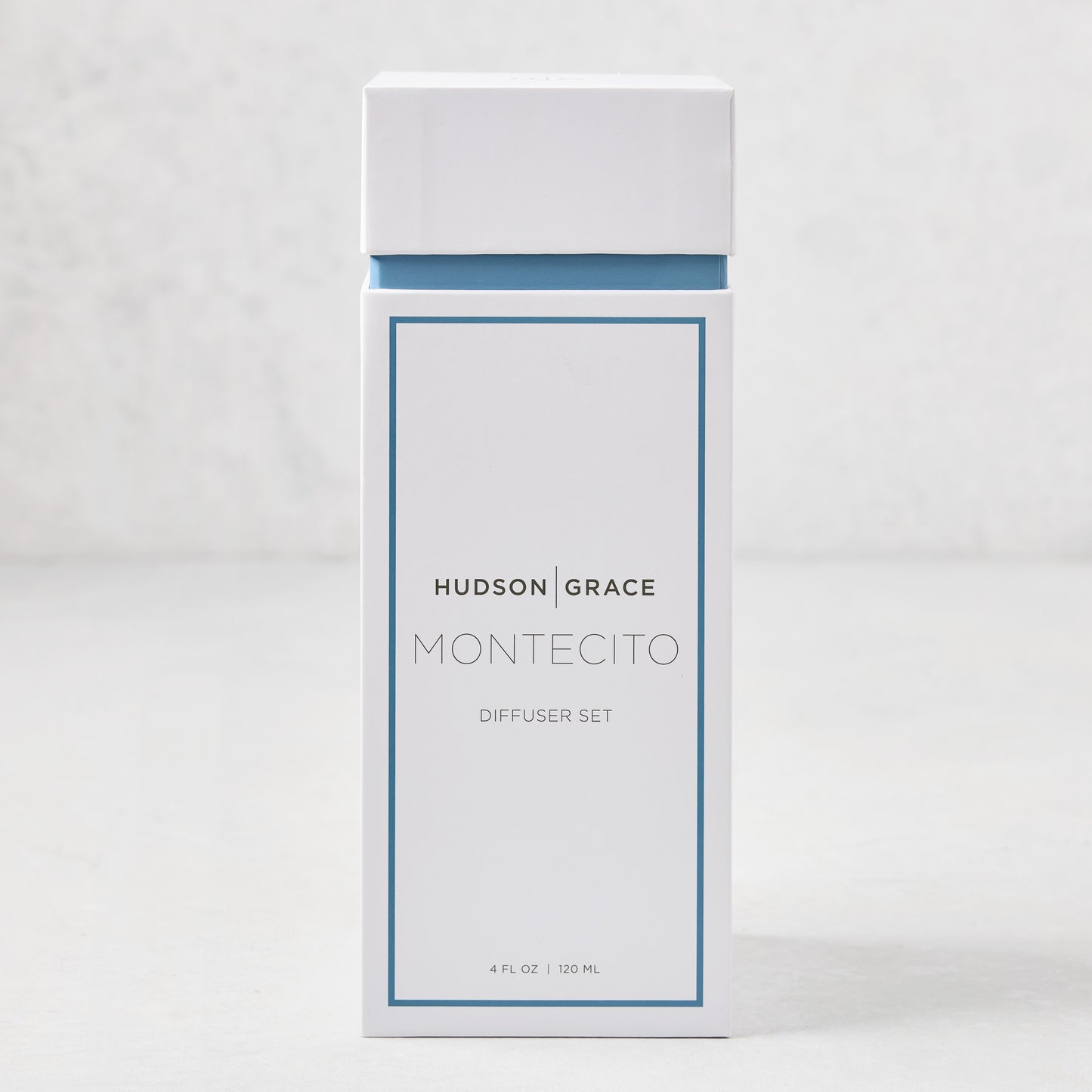 Hudson Grace Montecito reed diffuser set in a white box with blue trim, 4 fl oz.
