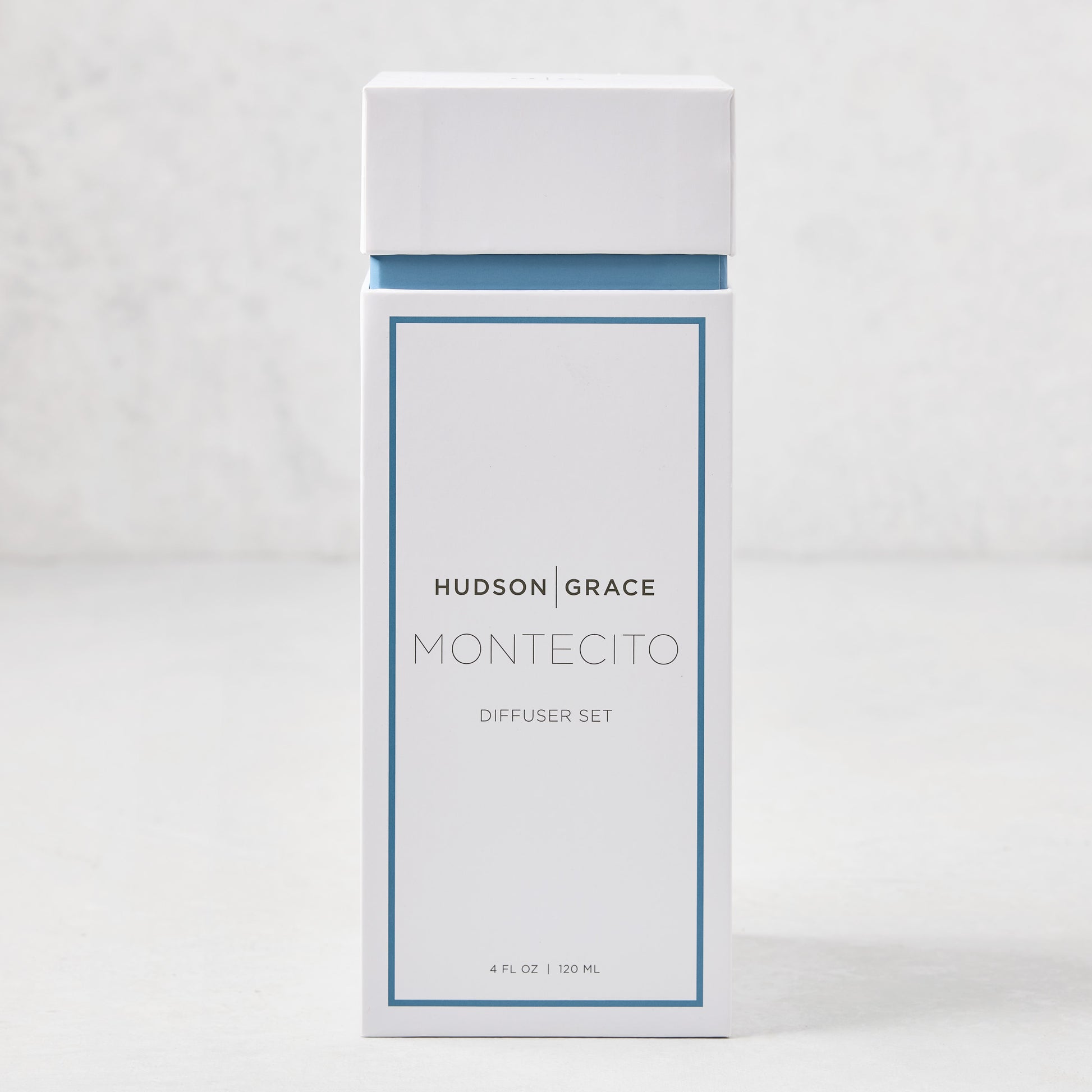 Hudson Grace Montecito reed diffuser set in a white box with blue trim, 4 fl oz.