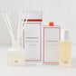 Hudson Grace Original Room Spray and Diffuser Gift Set with minimalist glass vessels and white packaging.