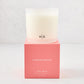 Hudson Grace Palm Beach 3-wick candle in a frosted glass vessel with a coral pink box.