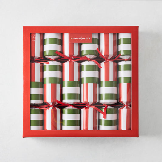 Set of 6 holiday crackers in a red box, featuring red, green, and white vertical striped paper with red ribbon ties.