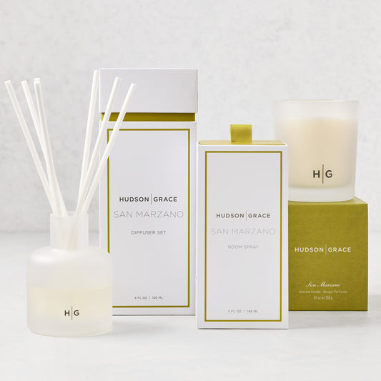 Hudson Grace San Marzano scent gift set: white diffuser, room spray, and candle with olive green accents.
