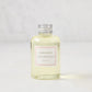 Hudson Grace Savannah scented reed diffuser oil refill, 4oz clear glass bottle with silver cap and pink label.