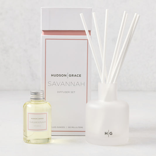 Hudson Grace Savannah Scented Reed Diffuser set with frosted glass vessel, oil bottle, and white reeds.