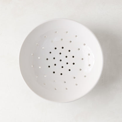 Hudson Grace white ceramic berry bowl, 9"Dia. x 2.5"H, with drainage holes.