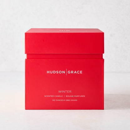 Hudson Grace Winter scented grand candle in a large, square red box with white minimalist branding.