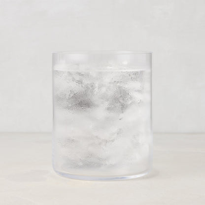 Hugo Clear Double Old Fashioned Glass, 3.25"Dia x 4"H, filled with ice and water, condensation on glass.