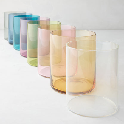 Row of Hugo Pink Double Old Fashioned Glasses in various pastel colors, including clear, pink, and amber.