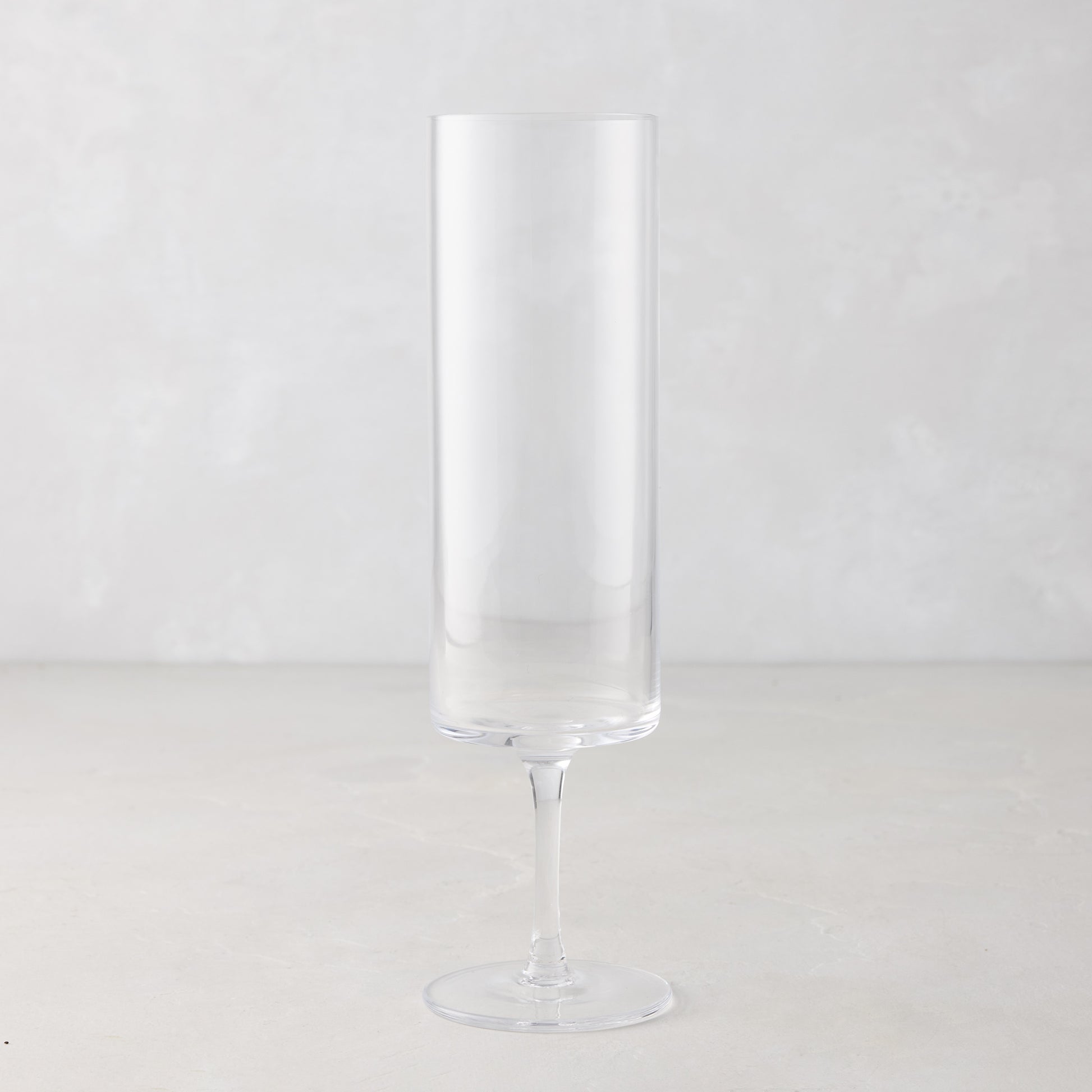 Clear Hugo Stemmed Champagne Flute, 2"Dia x 8.3"H, made of glass, with a modern, chic design.