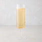 Hugo Stemmed Champagne Flute, clear glass, filled with bubbly golden champagne, 2"Dia x 8.3"H.