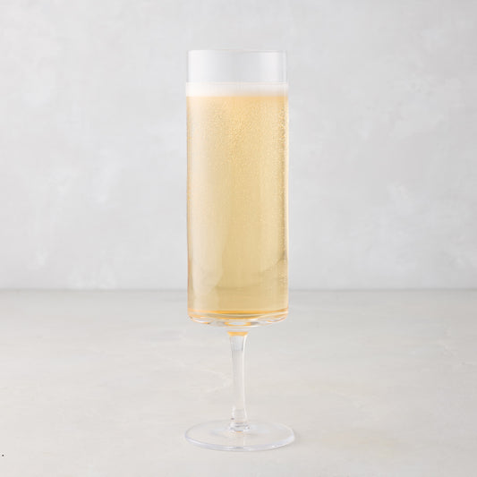 Hugo Stemmed Champagne Flute, clear glass, filled with bubbly golden champagne, 2"Dia x 8.3"H.