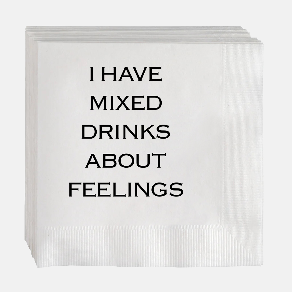 White paper cocktail napkins with "I HAVE MIXED DRINKS ABOUT FEELINGS" in black text.
