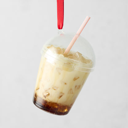 Hand-painted glass and resin iced coffee ornament with a red ribbon, straw, and ice cubes.