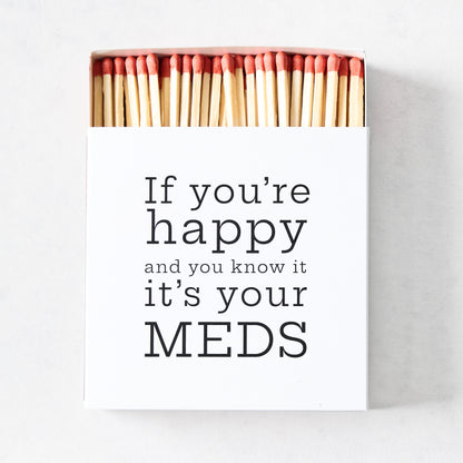 White box of oversized 4-inch matches with red tips and black text reading If you're happy and you know it it's your MEDS.