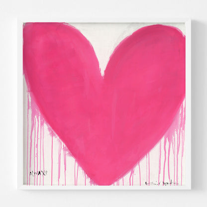 Kerri Rosenthal "In My Heart" art print, a vibrant pink drippy heart on white, framed in matte white wood.