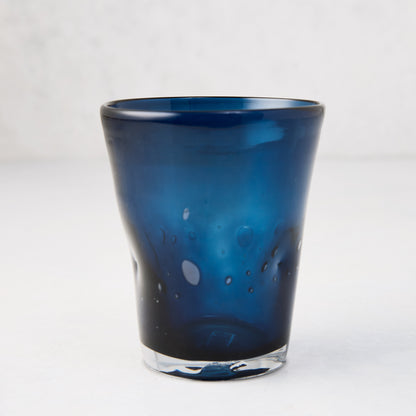 Indigo Henri mouth-blown glass, 8 oz, with unique imperfections and air bubbles.