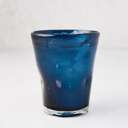 Handmade indigo Henri glass, 8 oz, with unique imperfections and small air bubbles.