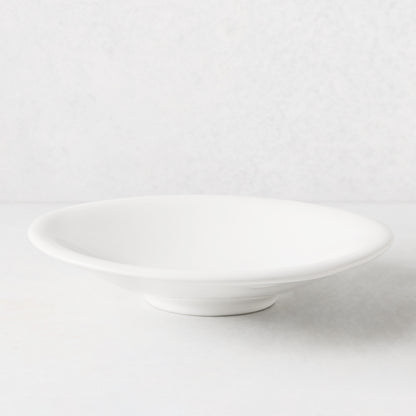 White individual ceramic pasta bowl, 10.75" diameter, shallow and wide, with a subtle footed base.