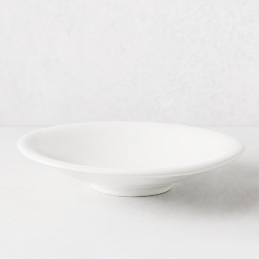 White individual ceramic pasta bowl, 10.75" diameter, shallow and wide, with a subtle footed base.