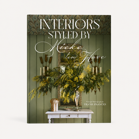 Interiors: Styled by Mieke ten Have hardcover book featuring a green interior scene with yellow flowers and a white table.
