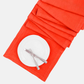 International Orange HG Signature Hand-dyed Linen Table Runner, 18" x 108", with white plate and silverware.