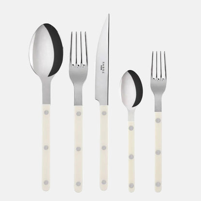Ivory Bistro 5-piece flatware set with stainless steel and acrylic handles.