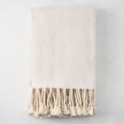 Ivory chevron cotton throw blanket with thick rope fringe, 48"W x 70"L.