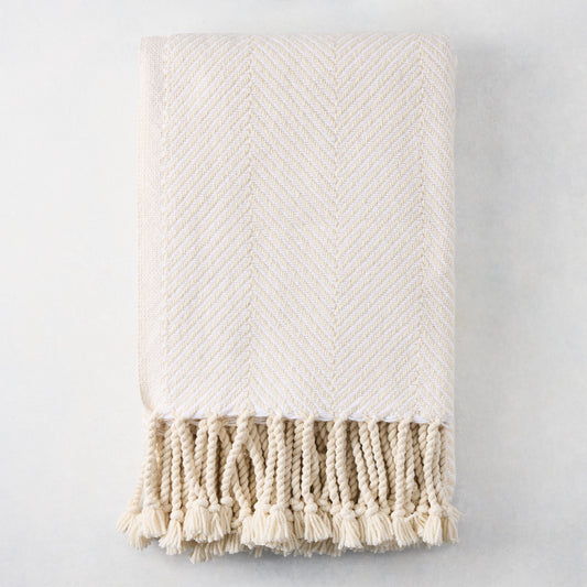 Ivory chevron cotton throw blanket with thick rope fringe, 48"W x 70"L.
