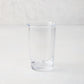 Clear Jacob Scissor-Cut Glass Tumbler, 8 oz., with a unique rippled rim.