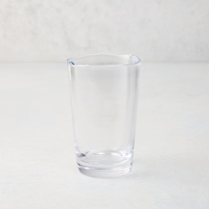 Clear Jacob Scissor-Cut Glass Tumbler, 8 oz., with a unique rippled rim.