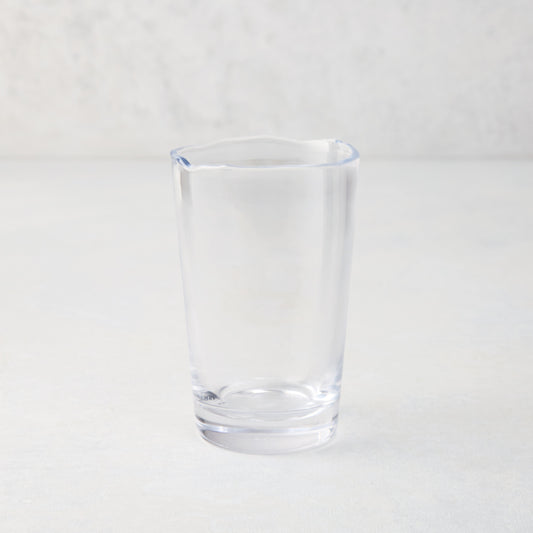 Clear Jacob Scissor-Cut Glass Tumbler, 8 oz., with a unique rippled rim.